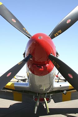  North American P-51 Mustang with a large-style spinner that fits over the propeller. 